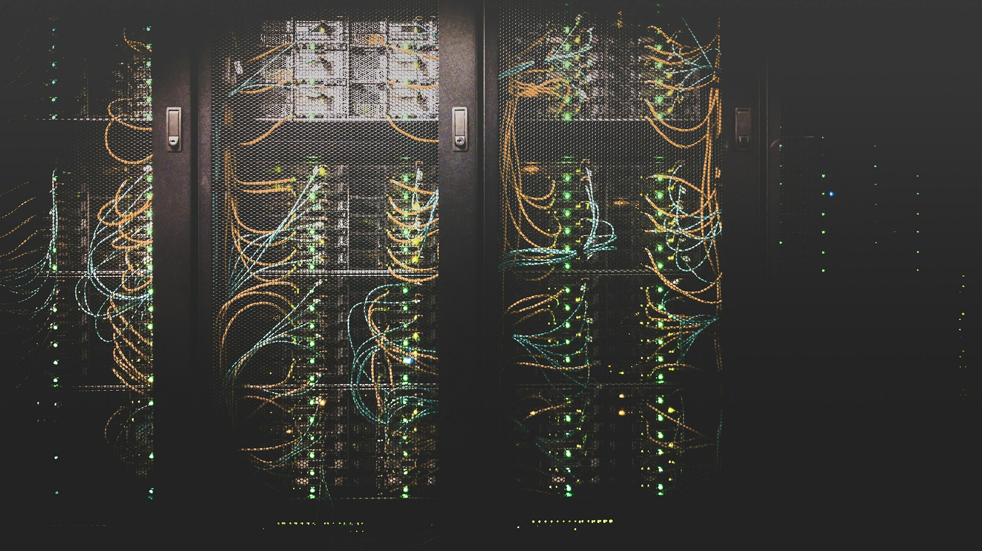 Cloud data center server racks with glowing green lights representing cloud infrastructure services